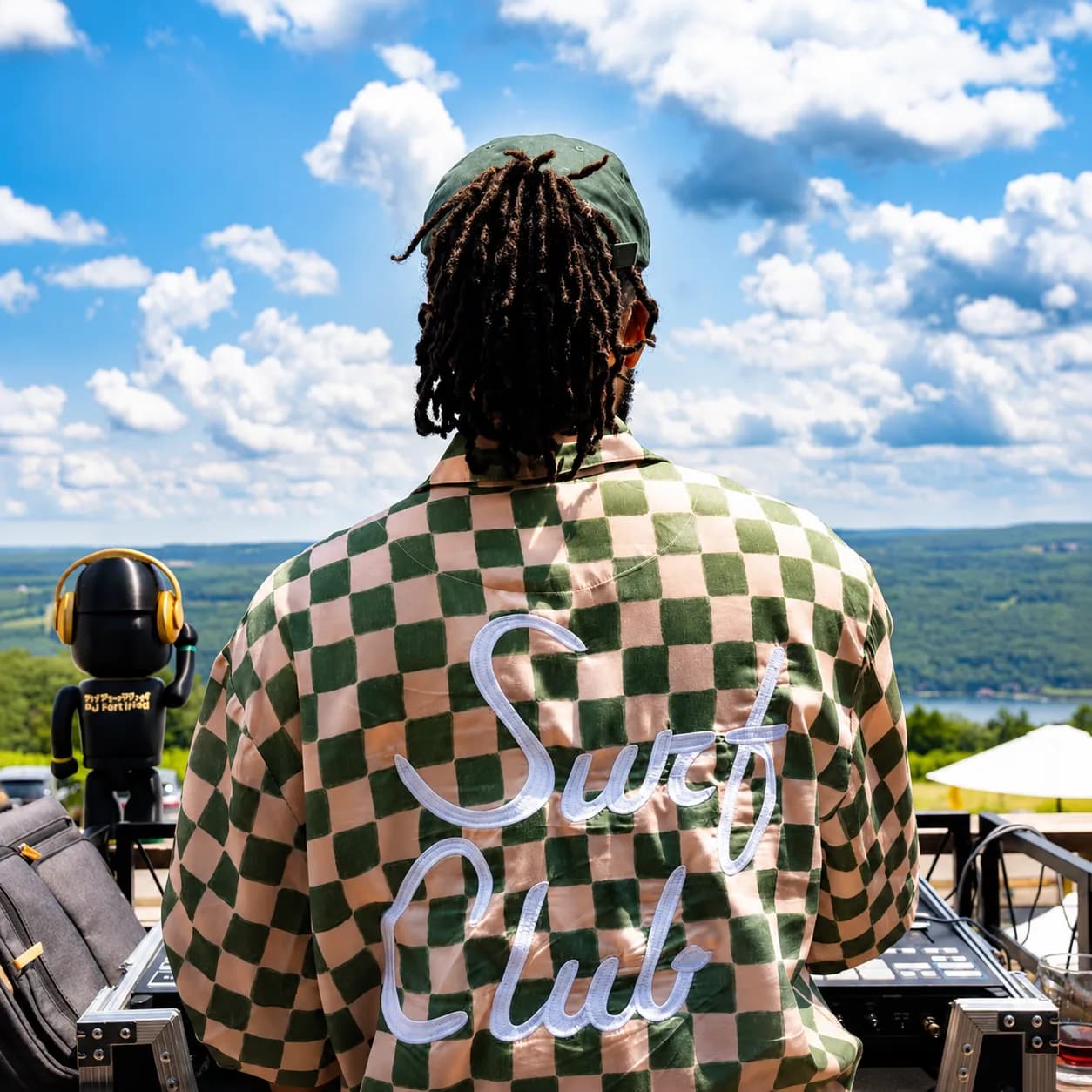 DJ Ruption at the decks overlooking the Finger Lakes, his custom Happi Buffalo on the booth