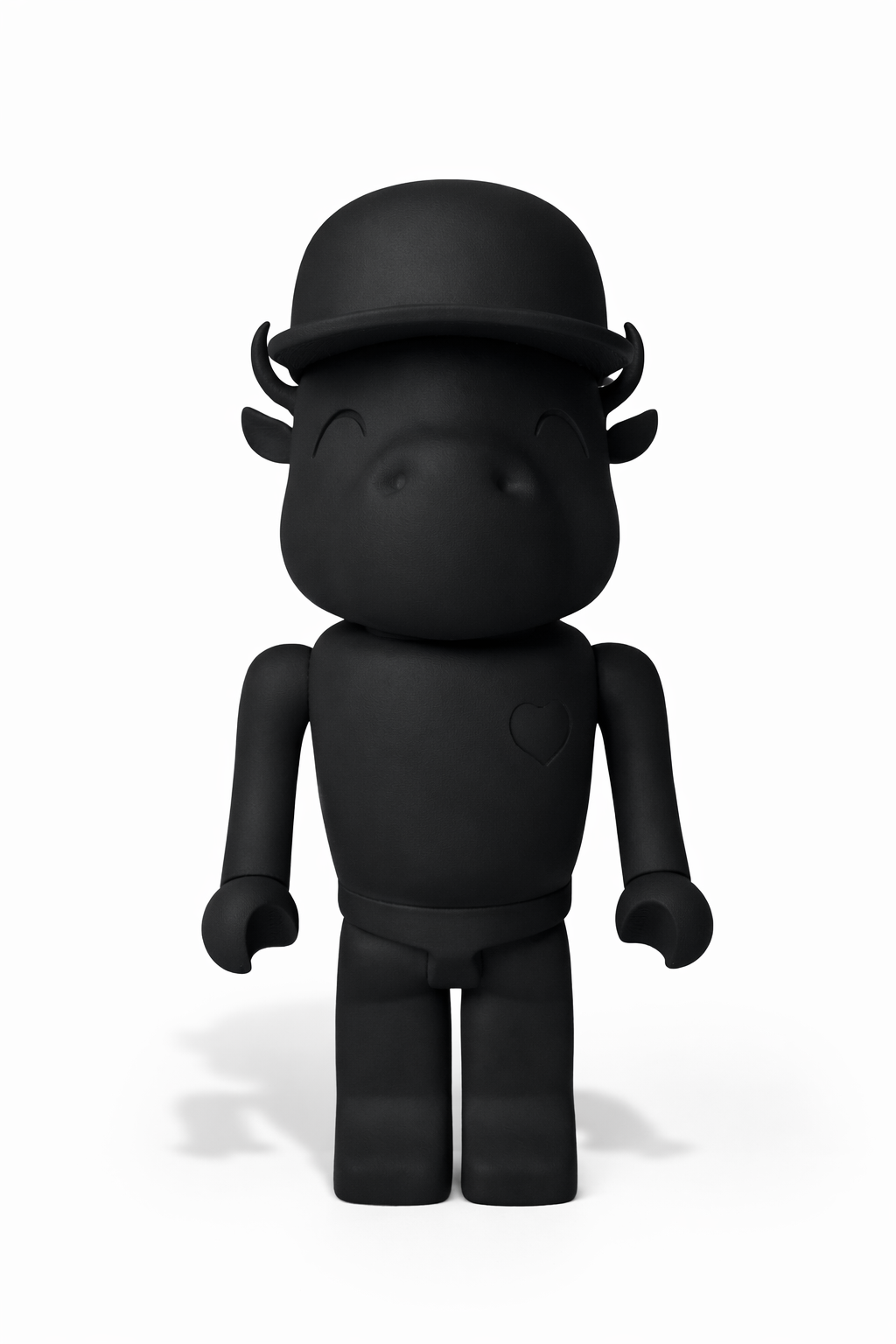 Matte black buffalo sculptural figure with minimalist form and heart emblem, Signature Obsidian edition